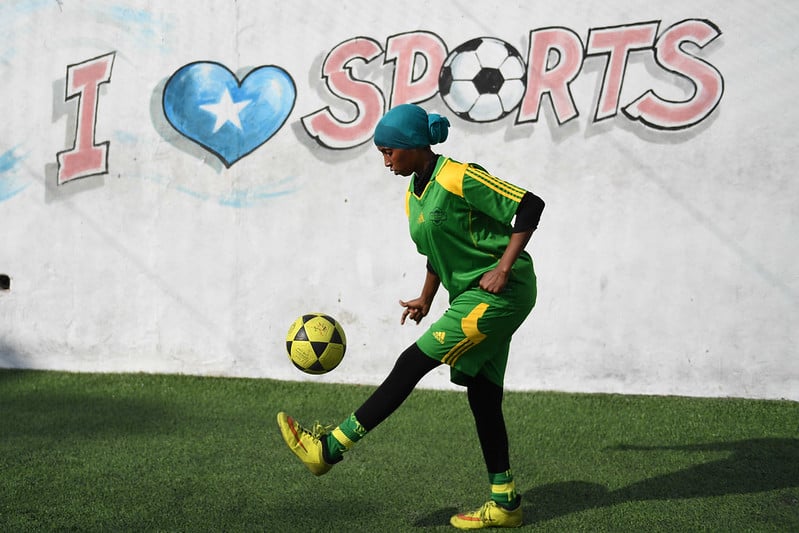 A female soccer player juggles a ball during a training session for Golden Girls Football Club in Mogadishu, Somalia on February 18, 2017. The club is the first known Somali female football team, which is testimony the ever-increasing empowerment of women and girls in Somalia, a feat made possible by the stabilization efforts of the African Union Mission in Somalia (AMISOM). AMISOM Photo / Ilyas Ahmed